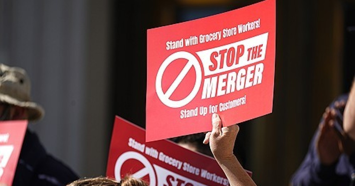 Grocery Stores Merger Protest