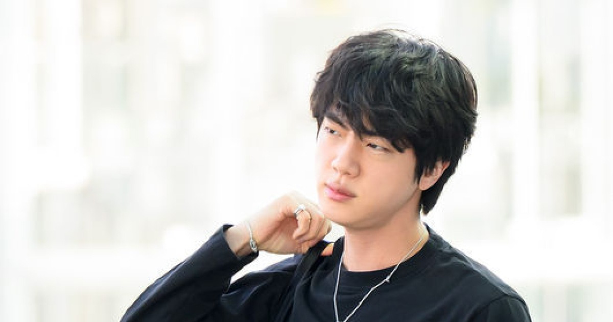 BTS's Jin Wore His Maknae's Face to the Airport Before 100,000-Fan South America Tour