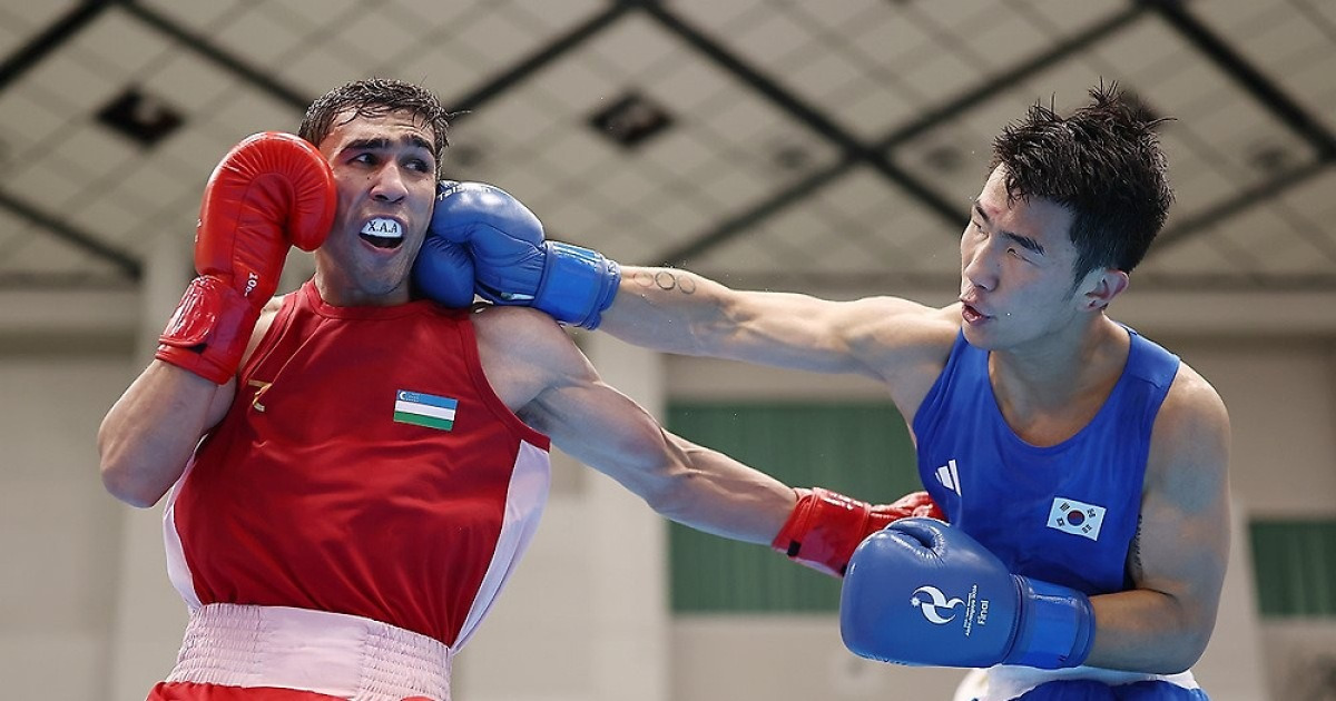 Photo: v.daum.net Korean Boxers Jang and Kim Win Silver Medals at Asian Games After 12-Year Wait