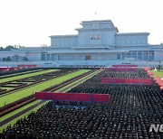 북한, 수해복구전 벌인 북한 수도당원사단 전투원들 보고대회