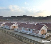 수해 입었던 북한 함경남도 검덕지구에 늘어선 단층 새 살림집들