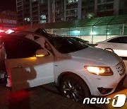 술 취해 아파트 18층 투신..파손된 SUV