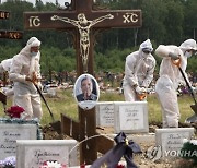 Virus Outbreak Russia Deaths