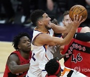 APTOPIX Raptors Suns Basketball