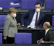 Virus Outbreak Germany Parliament