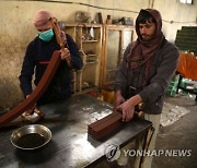 AFGHANISTAN ECONOMY SOAP FACTORY