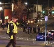 Police Car Hits Pedestrians