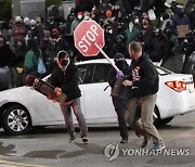 APTOPIX Police Car Hits Pedestrians