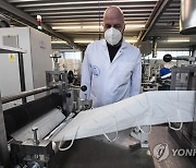 Virus Outbreak Germany Mask Production
