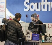 USA SOUTHWEST AIRLINES REPORTS ANNUAL LOSS