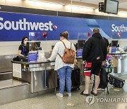 USA SOUTHWEST AIRLINES REPORTS ANNUAL LOSS