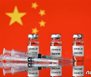 中 보건당국, 효능 50% 시노백 코로나 백신 일반사용 승인(상보)
