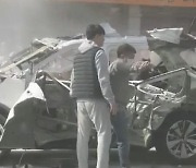 주행 중 차량 '폭발' 인근 상인들 재빠른 대처 더 큰 화 막았다