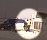 경찰관 뒤로 미끄러진 화물차..가까스로 피해|뉴스브리핑