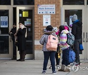 Virus Outbreak Chicago Schools
