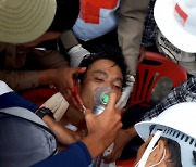 [사진] 미얀마 쿠데타 한달..'피의 일요일' 진압에 최소 9명 사망