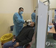 Virus Outbreak Palestinians Vaccines