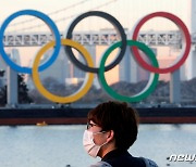 불투명한 올림픽 행보에 '김빠진' 일본의 11만 자원봉사자들