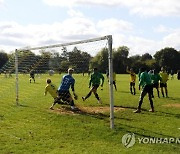 BRITAIN PHOTO ESSAY SANCTUARY STRIKERS GRASSROOT SOCCER