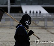 Virus Outbreak Brazil Protesters