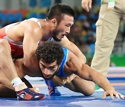 Wrestling team earns two spots in the Olympic ring