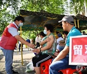 "중국, 10주내 화이자 백신 승인 결정한다"