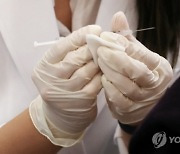 화이자 백신 접종 70대 경비원 사망..사인 조사