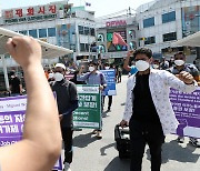 [Photo] Migrant workers rally for labor rights