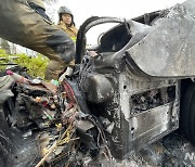 '차량 화재로 전소된 승용차 트렁크'