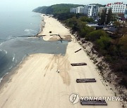 POLAND BEACH WIDENING