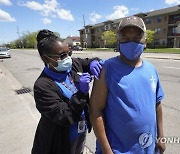 Virus Outbreak Mobile Vaccinations Detroit