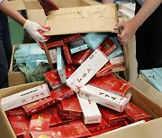 외국인 명의도용해 중국산 담배 1천700보루 밀수 중국인 구속