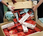 외국인 명의도용해 중국산 담배 밀수 중국인 구속