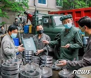 북한 "백절불굴의 혁명 정신과 자력갱생으로 알곡고지 점령"