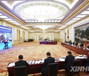 CHINA-BEIJING-WANG YANG-LAOS-MEETING (CN)