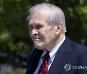 (FILE) USA RUMSFELD OBIT