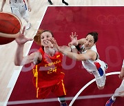 Basketball team drops hard-fought first game to Spain