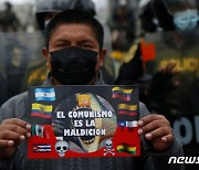 '공산주의는 저주'..좌파 대통령 반대 시위 열린 페루