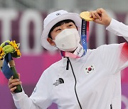 Korean archer An San makes history with third gold medal