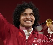 CORRECTION Tokyo Olympics Weghlifting Men