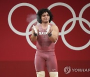 CORRECTION Tokyo Olympics weightlifting
