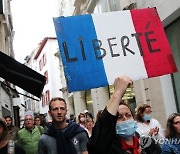 Virus Outbreak France Protests