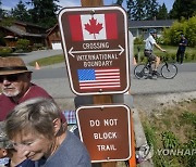 Virus Outbreak US Canada