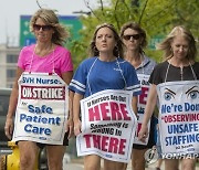 Virus Outbreak Nurses Strike