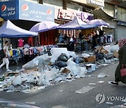 MIDEAST PALESTINIANS HEBRON GARBAGE