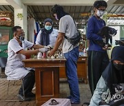 INDONESIA ANIMALS RABIES VACCINATION