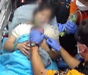 고속도로에서 출산, 숨 쉬지 않는 아기..119구급대원이 살렸다