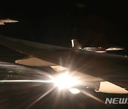국군 유해 호위비행하는 F-15K전투기