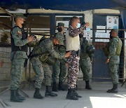 '수류탄에 참수까지' 에콰도르 교도소 폭동 발생..100명 이상 사망