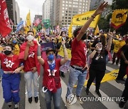 Virus Outbreak Brazil Protest